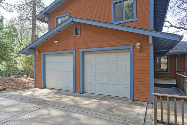 a view of a kitchen with a sink cabinets and a wooden floor