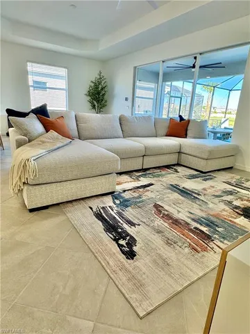 a white bath tub sitting next to a white sink