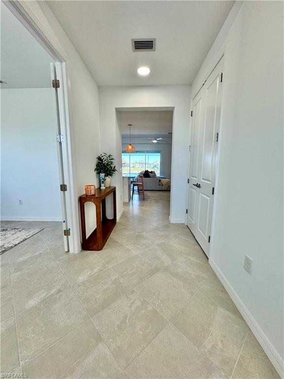 5376 Fancourt Links Way Ave Maria, FL 34142 - Photo 2 of 39 Corridor with baseboards