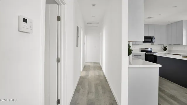 a bathroom with a toilet sink and shower