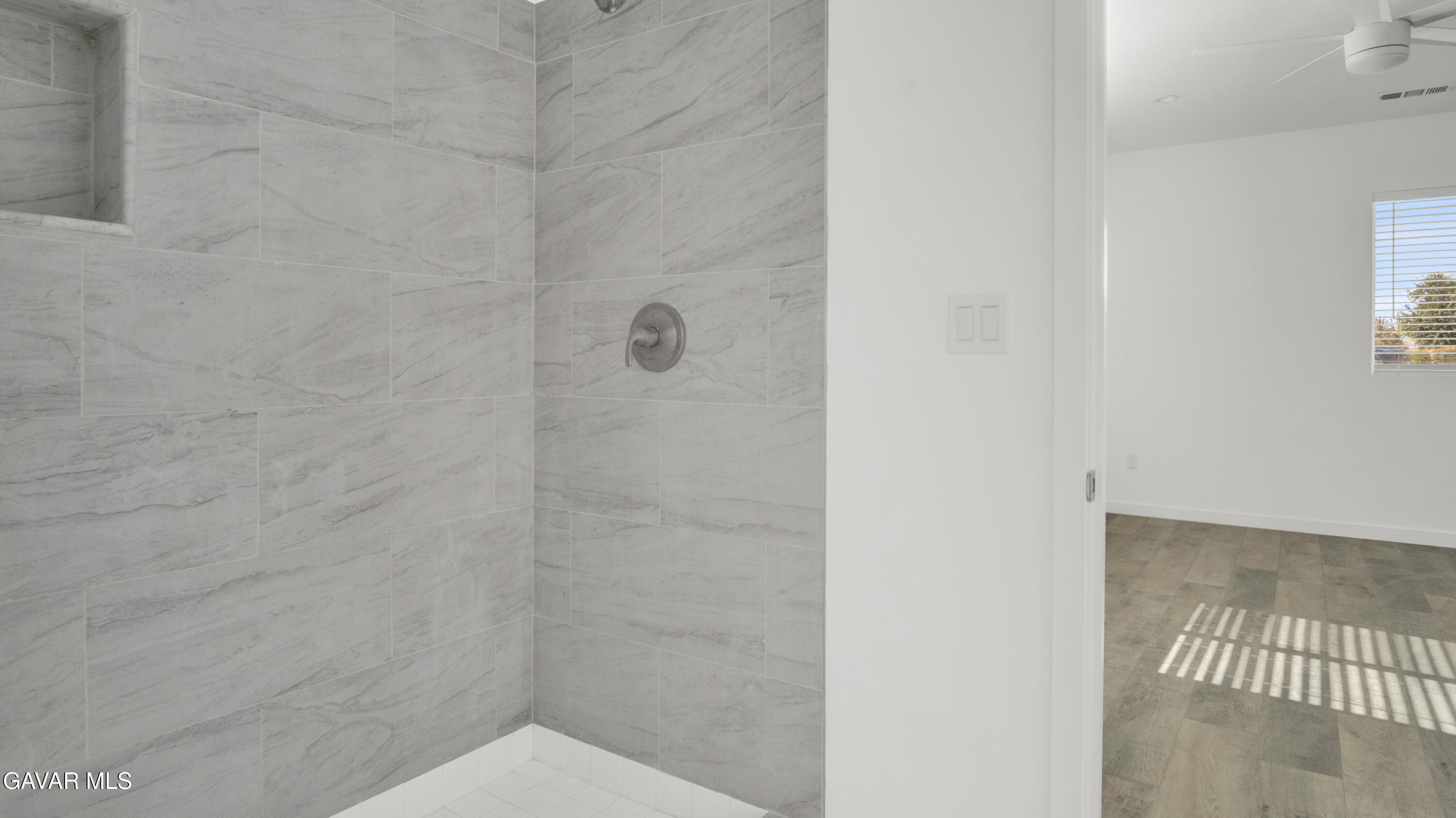 9701 E Avenue South Littlerock, CA 93543 - Photo 26 of 35 a bathroom with a shower