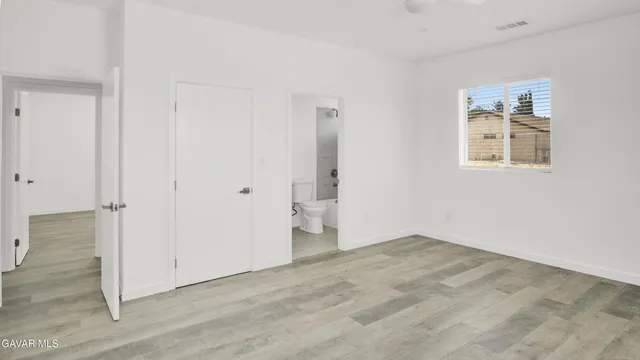 a bathroom with a sink a toilet and bathtub
