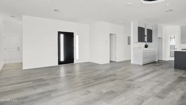 a view of a kitchen with electric appliances