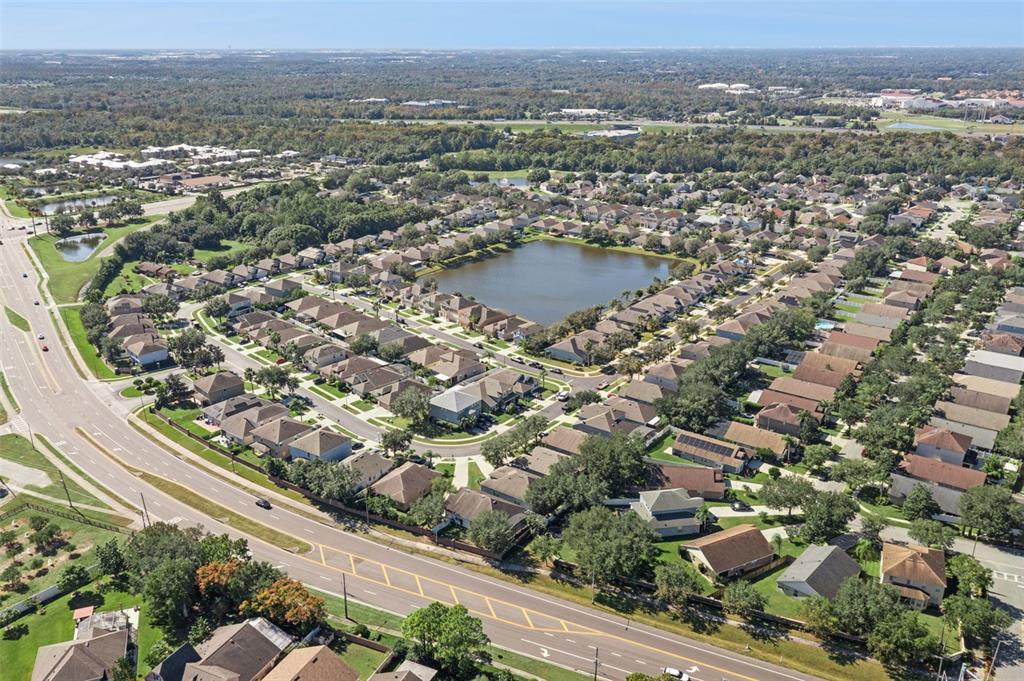 2718 Curpin Lane Orlando, FL 32825 - Photo 33 of 36 an aerial view of residential houses with city view