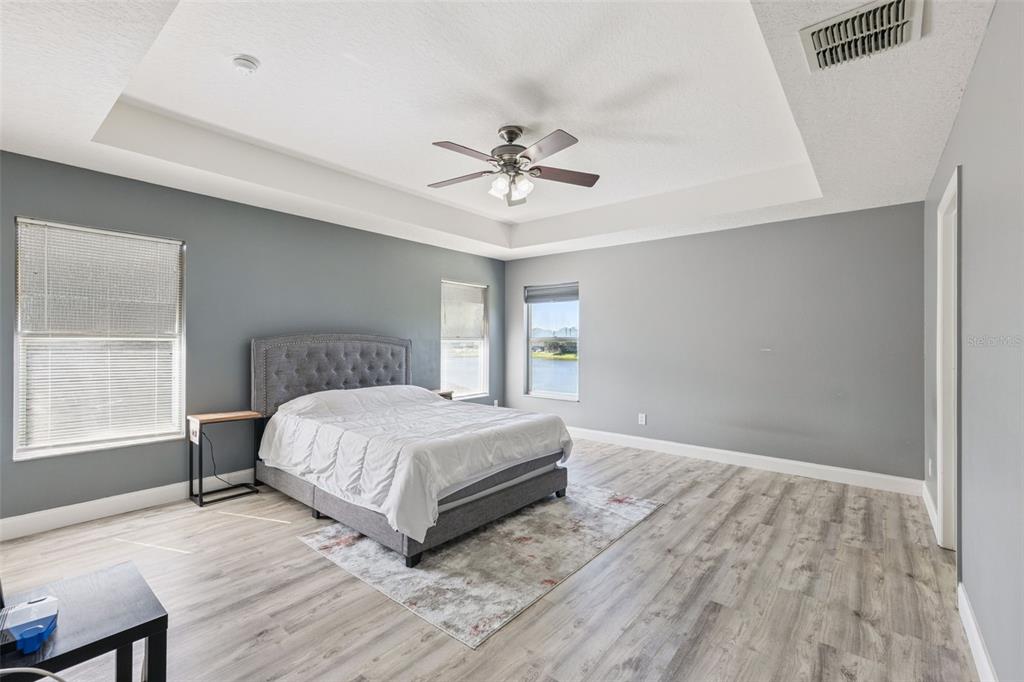 2718 Curpin Lane Orlando, FL 32825 - Photo 10 of 36 a bedroom with a bed and window