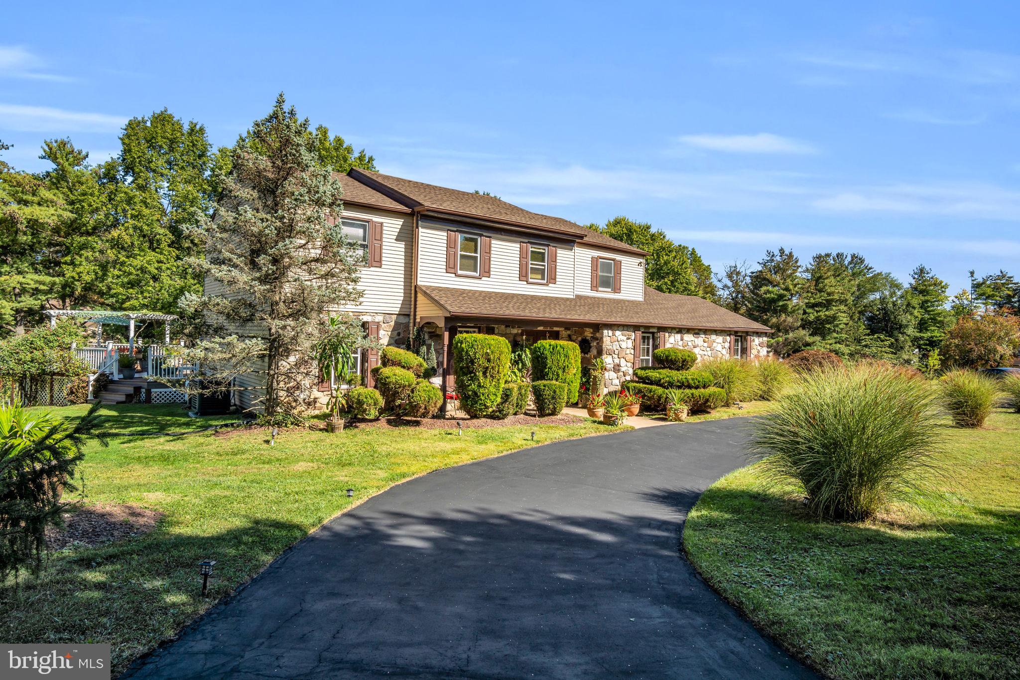 4280 Frontier Road Hatboro, PA 19040 - Photo 11 of 62 a front view of a house with a yard