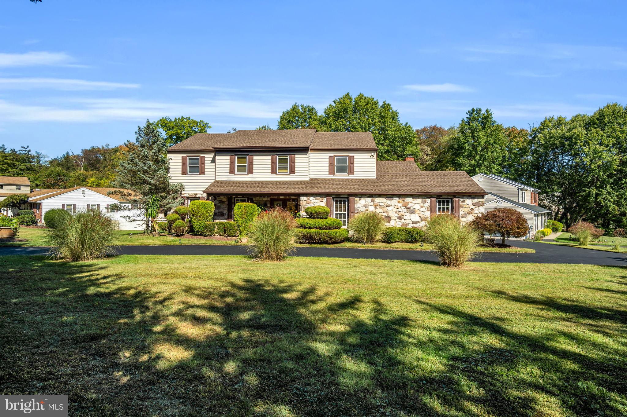 4280 Frontier Road Hatboro, PA 19040 - Photo 12 of 62 a front view of a house with a yard
