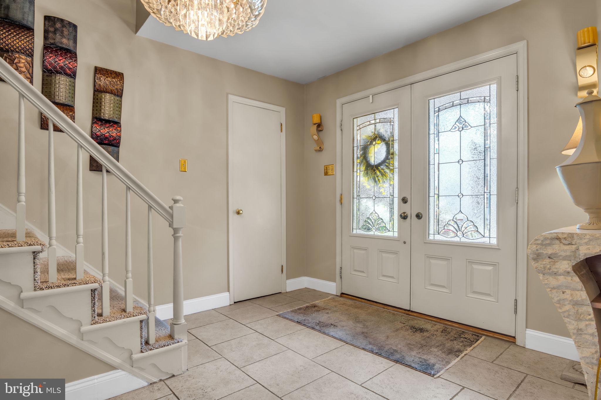 4280 Frontier Road Hatboro, PA 19040 - Photo 16 of 62 a view of an entryway with wooden floor