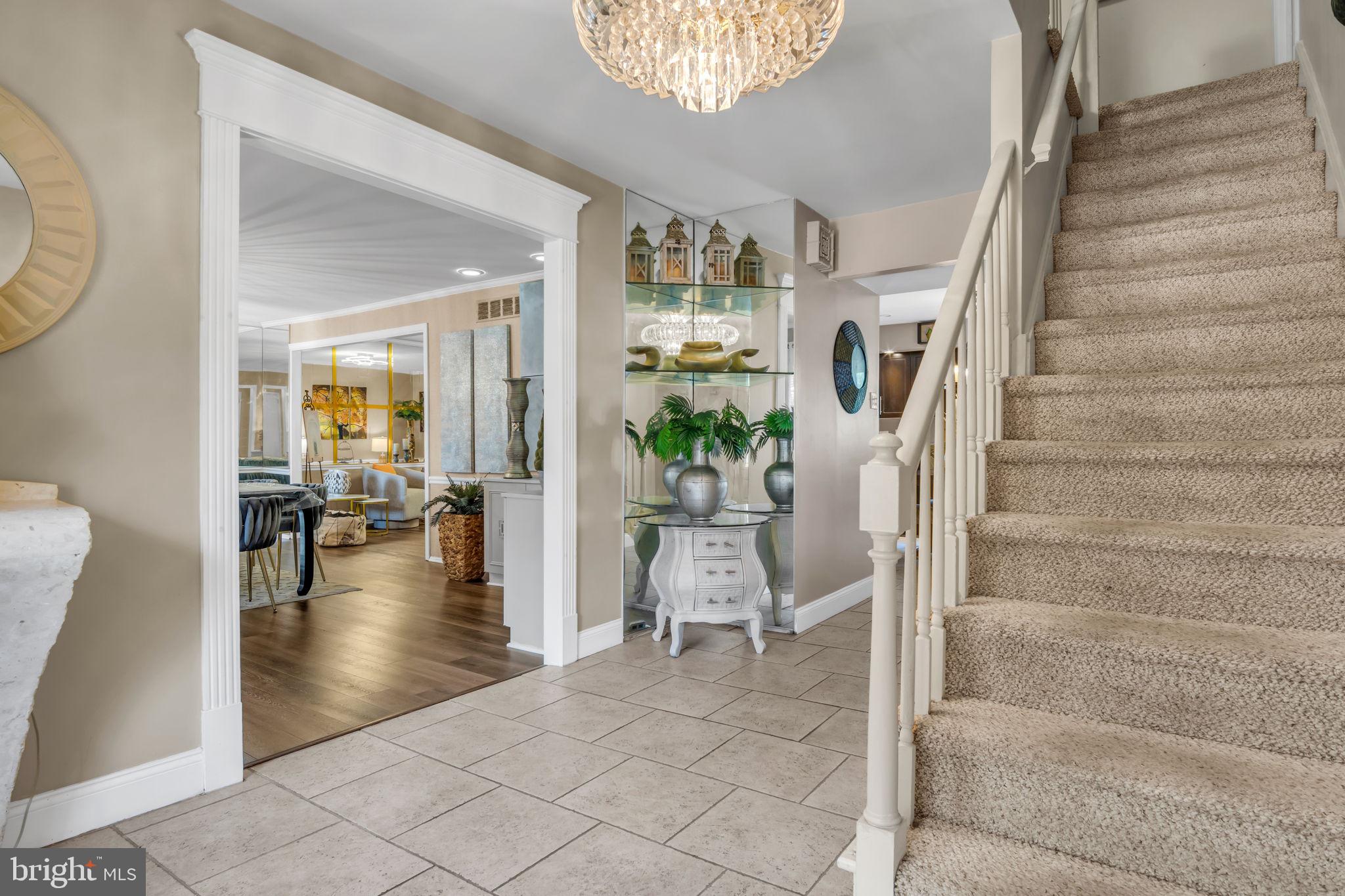 4280 Frontier Road Hatboro, PA 19040 - Photo 17 of 62 a view of an entryway with wooden floor and a livingroom view