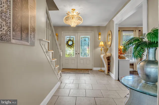 a kitchen with stainless steel appliances kitchen island granite countertop a sink and cabinets