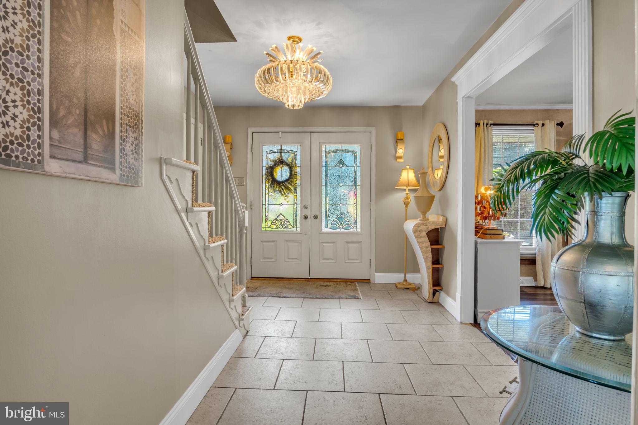 4280 Frontier Road Hatboro, PA 19040 - Photo 18 of 62 a view of entryway with livingroom and chandelier