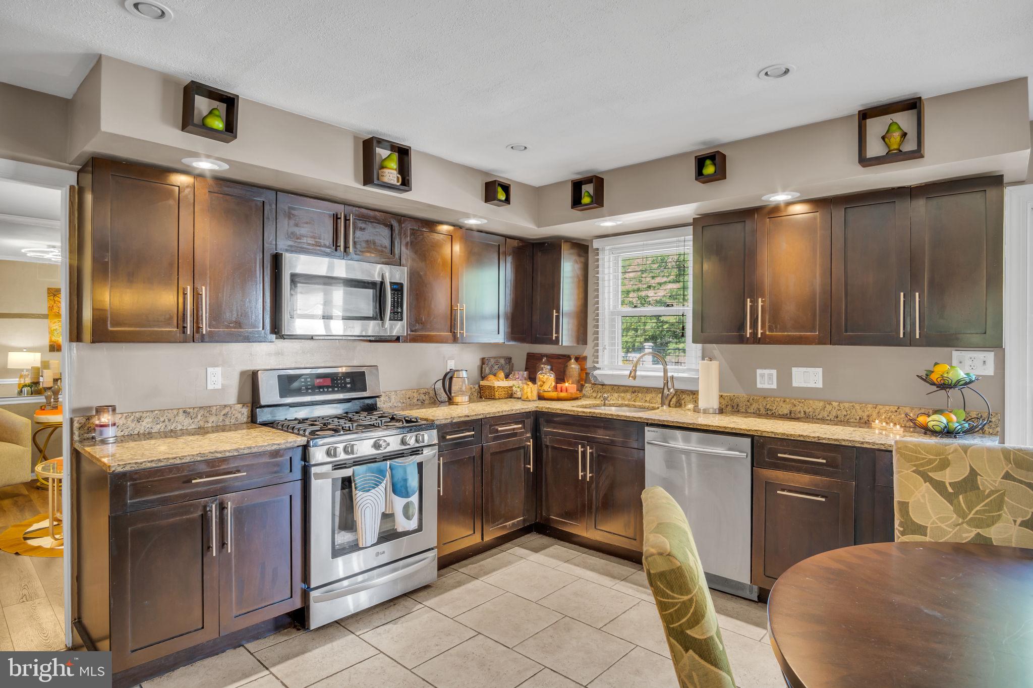 4280 Frontier Road Hatboro, PA 19040 - Photo 20 of 62 a kitchen with stainless steel appliances a sink stove and cabinets