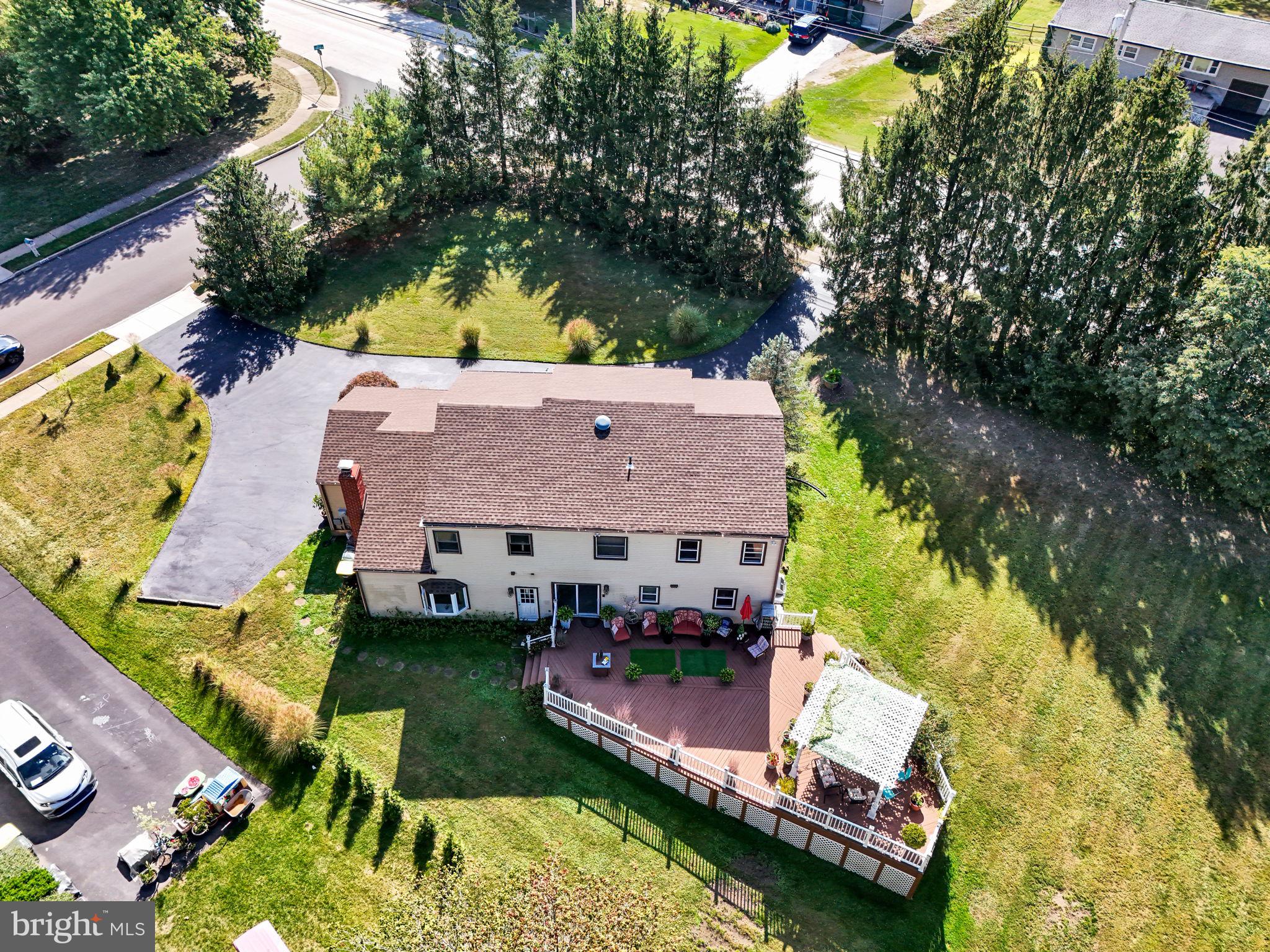 4280 Frontier Road Hatboro, PA 19040 - Photo 2 of 62 an aerial view of a house with a garden and swimming pool