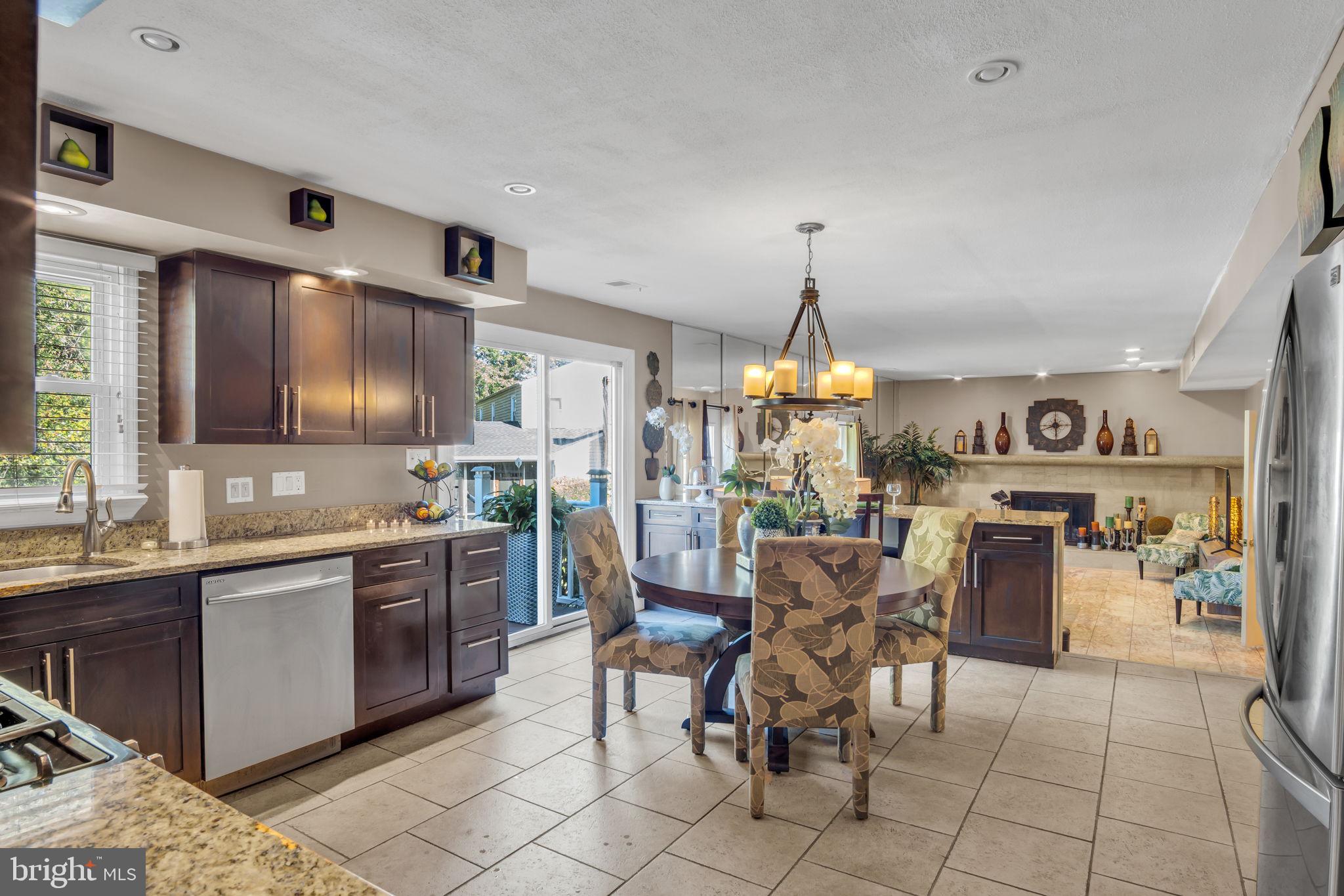 4280 Frontier Road Hatboro, PA 19040 - Photo 21 of 62 a kitchen with stainless steel appliances kitchen island granite countertop a sink and cabinets