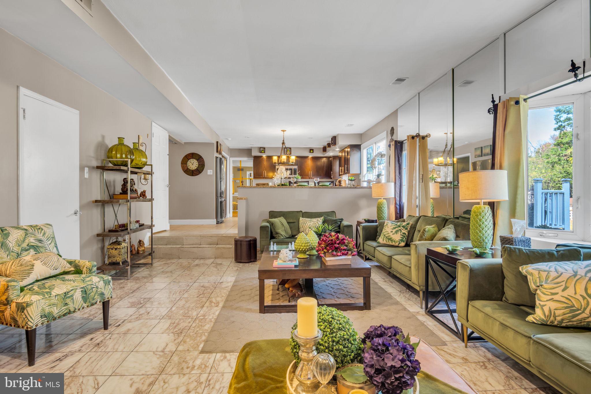 4280 Frontier Road Hatboro, PA 19040 - Photo 24 of 62 a living room with furniture and painting on the wall