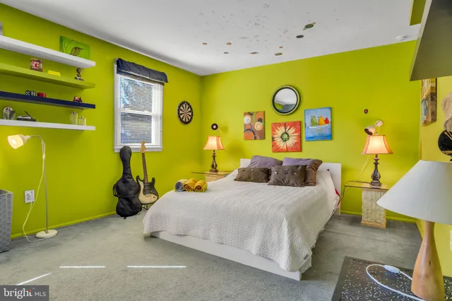 a bed room with a bed and a couch