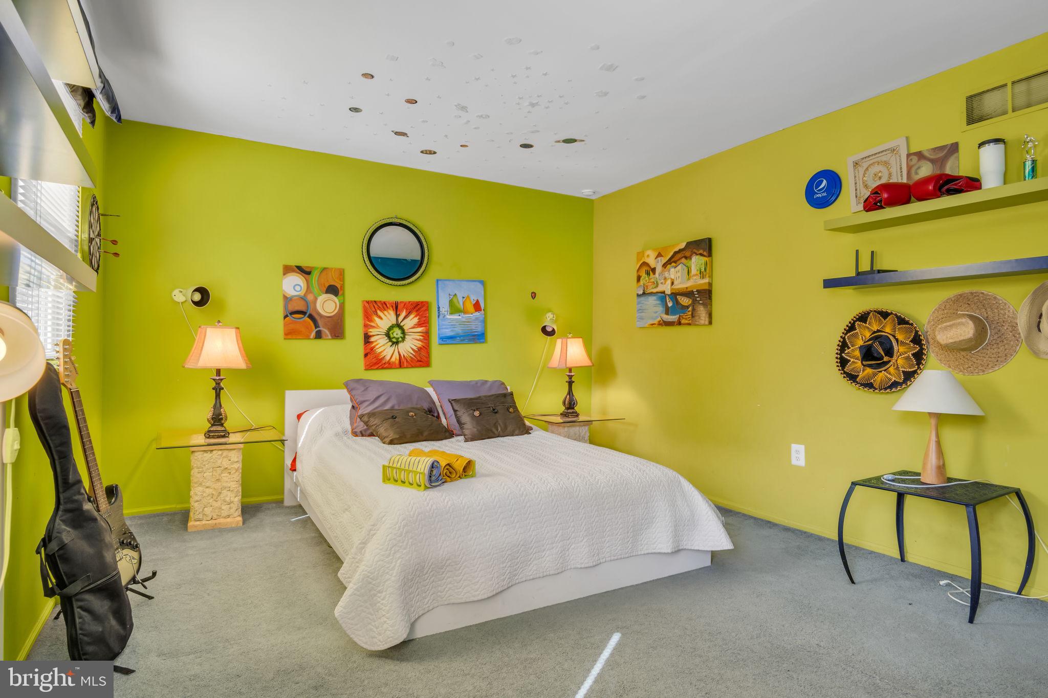 4280 Frontier Road Hatboro, PA 19040 - Photo 40 of 62 a bedroom with a bed and a flat screen tv