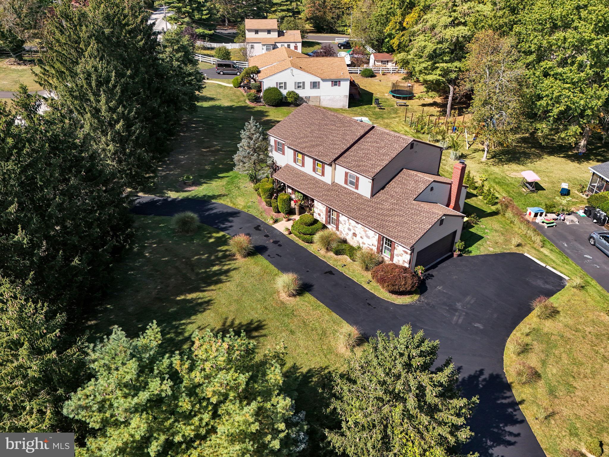 4280 Frontier Road Hatboro, PA 19040 - Photo 4 of 62 an aerial view of a house with a garden and lake view