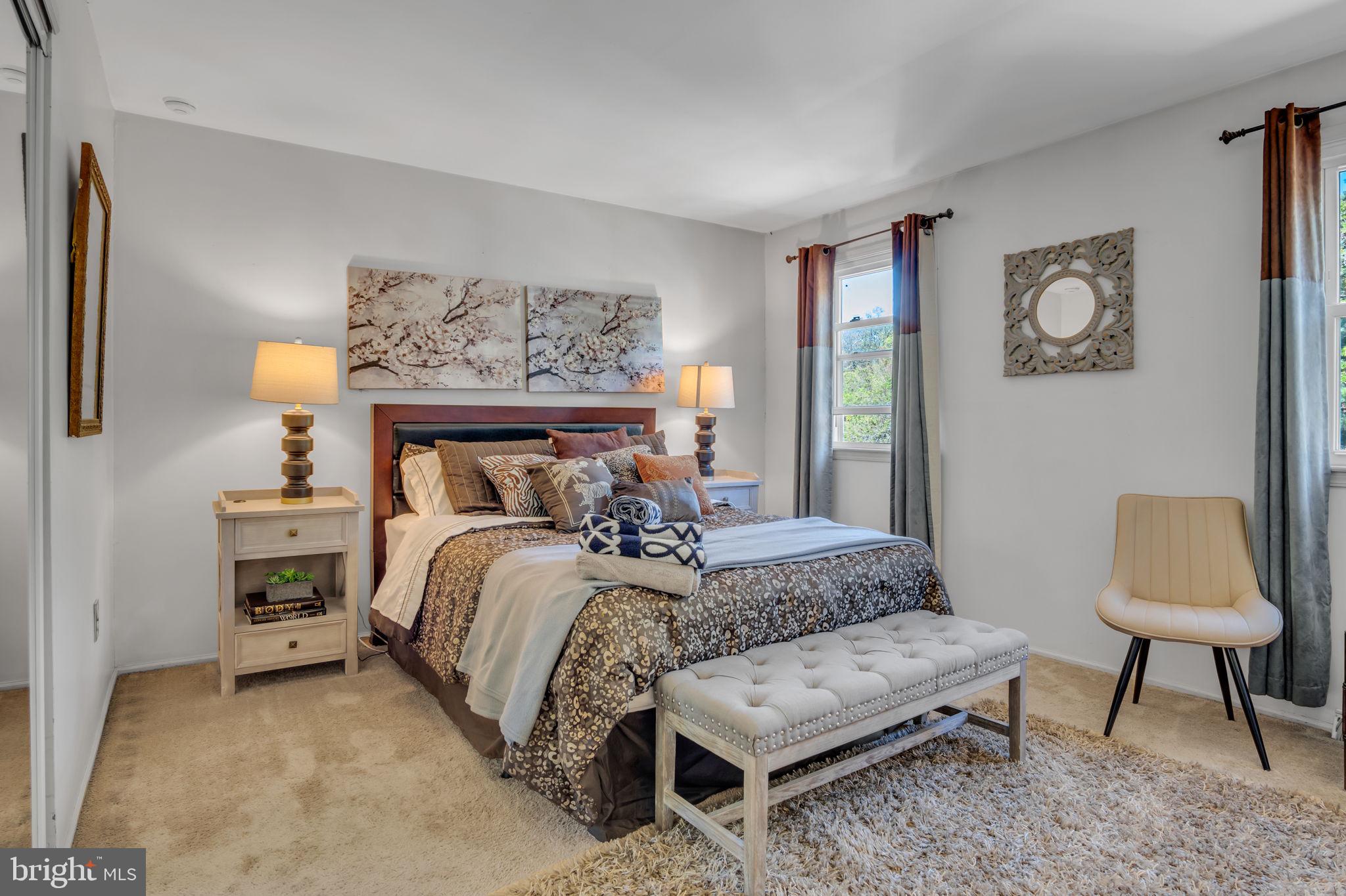 4280 Frontier Road Hatboro, PA 19040 - Photo 42 of 62 a bed room with a bed and a chair