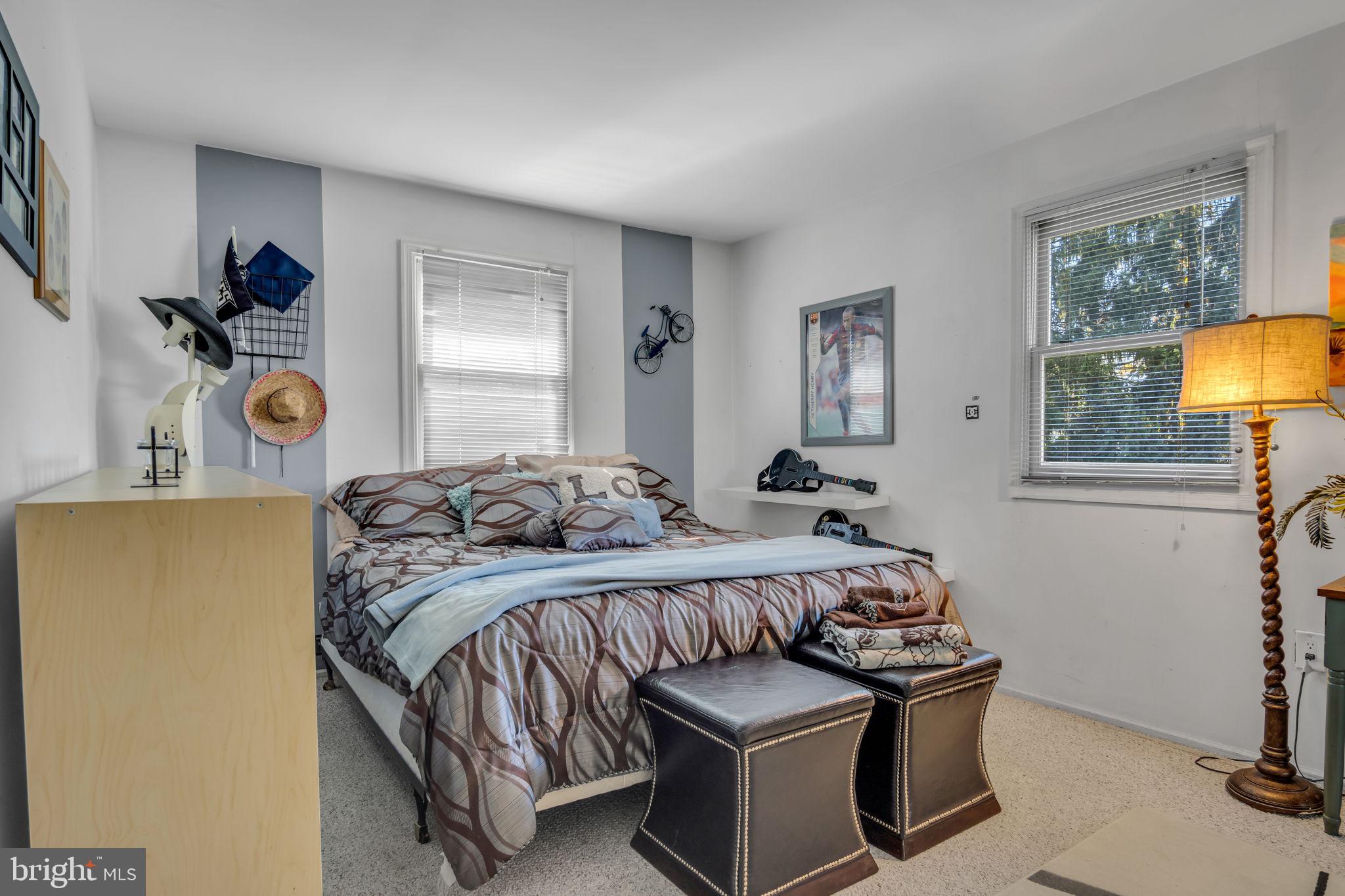 4280 Frontier Road Hatboro, PA 19040 - Photo 43 of 62 a bedroom with a bed and a dresser in it