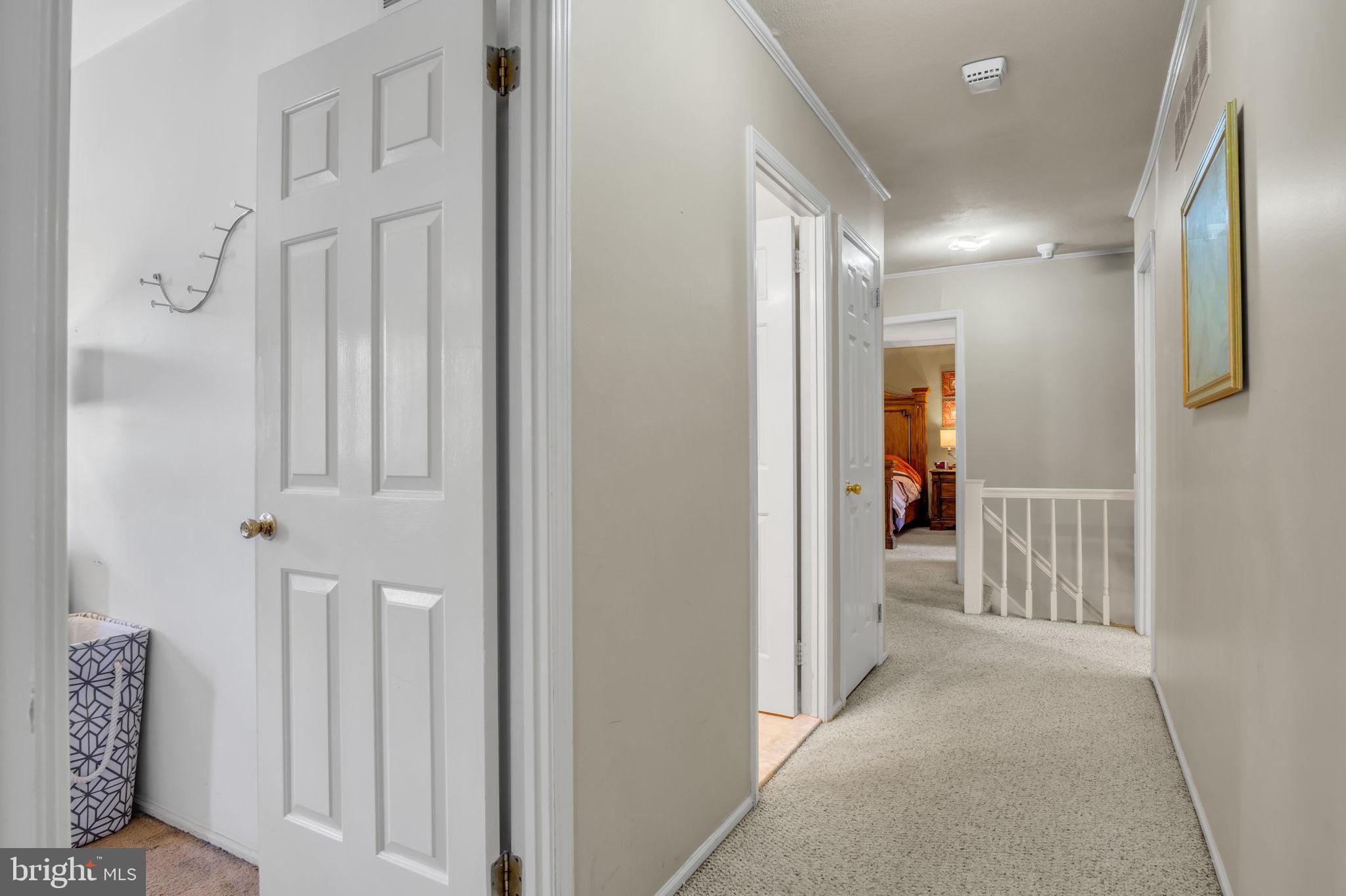 4280 Frontier Road Hatboro, PA 19040 - Photo 45 of 62 a view of a hallway with closet and a livingroom view