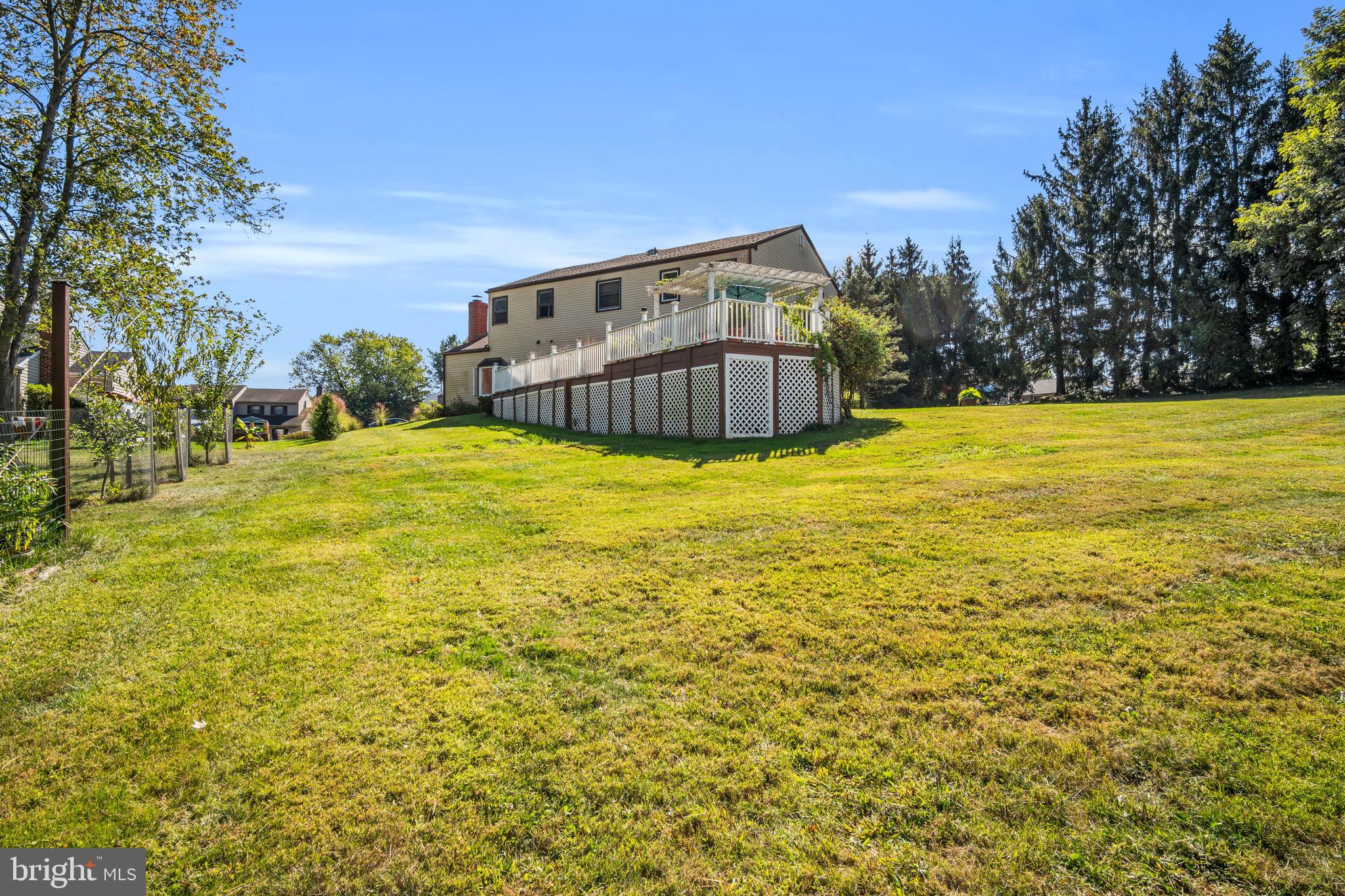 4280 Frontier Road Hatboro, PA 19040 - Photo 56 of 62 a view of a large pool with an outdoor space and seating area