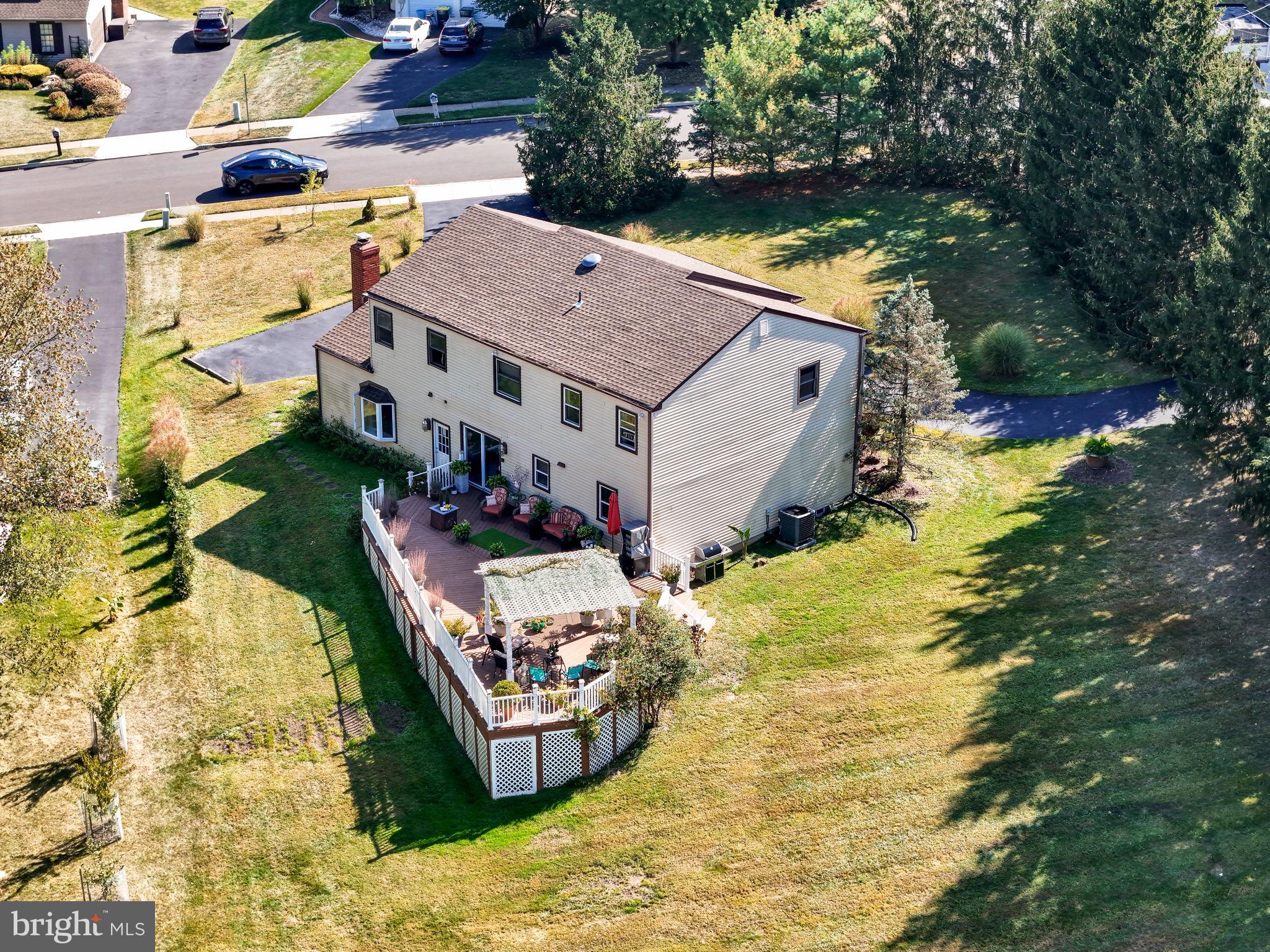 4280 Frontier Road Hatboro, PA 19040 - Photo 9 of 62 a aerial view of a house with swimming pool and large trees