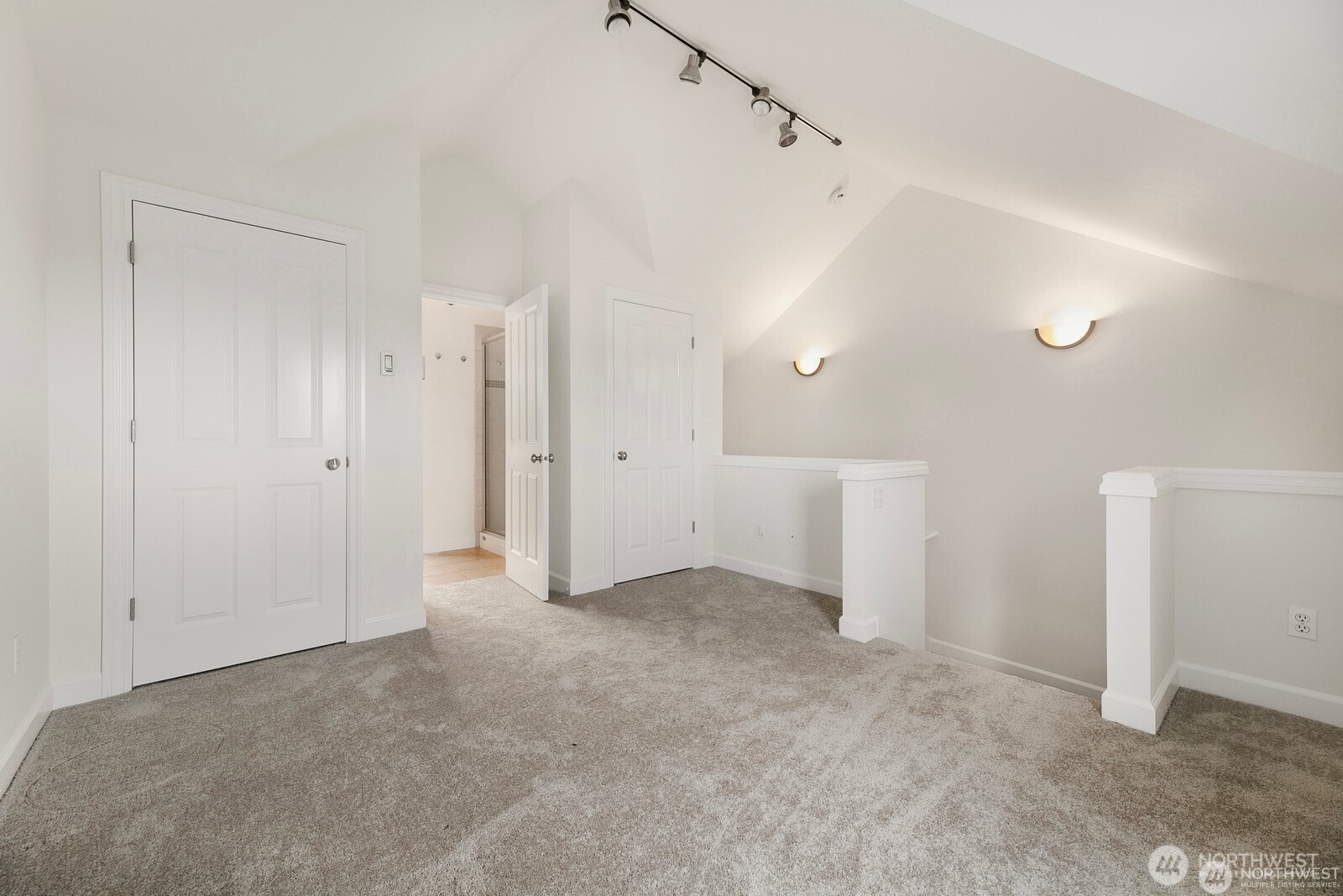 102 West Florentia Street, Unit A Seattle, WA 98119 - Photo 12 of 19 a view of a big room with closet and windows