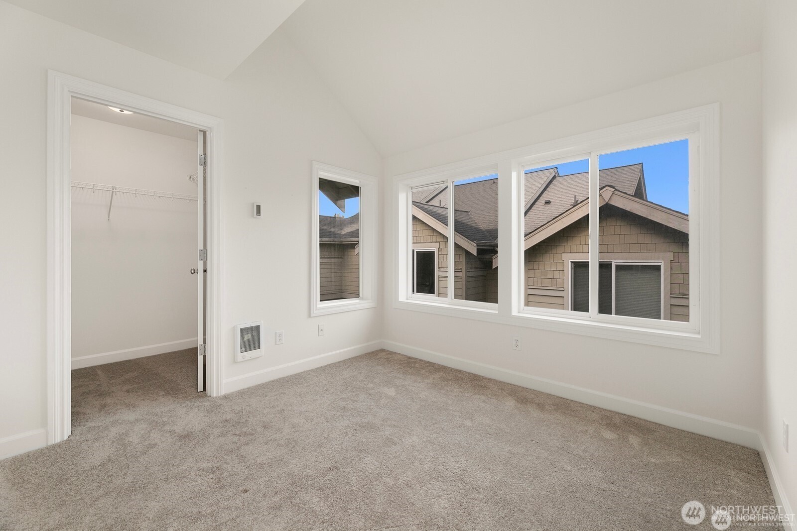 102 West Florentia Street, Unit A Seattle, WA 98119 - Photo 13 of 19 an empty room with windows