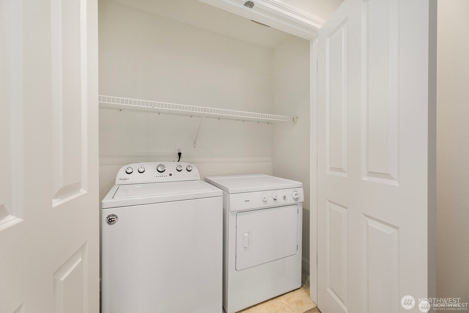102 West Florentia Street, Unit A Seattle, WA 98119 - Photo 18 of 19 a utility room with dryer and washer