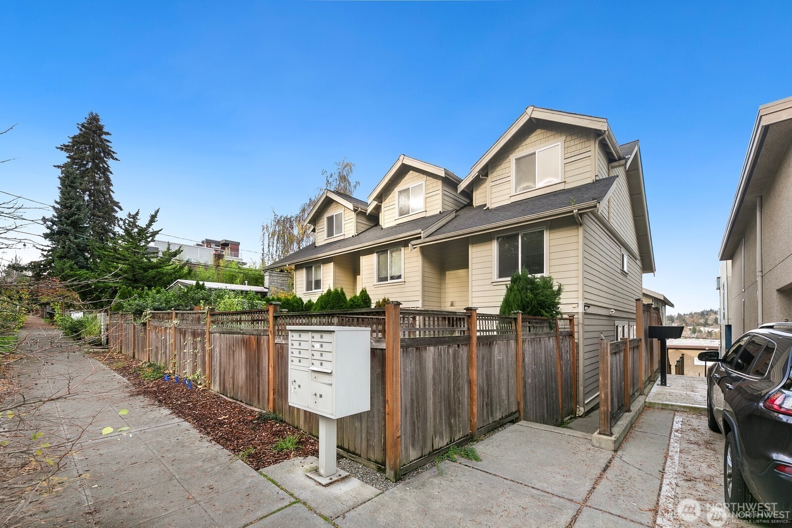 102 West Florentia Street, Unit A Seattle, WA 98119 - Photo 2 of 19 a front view of a house with a porch