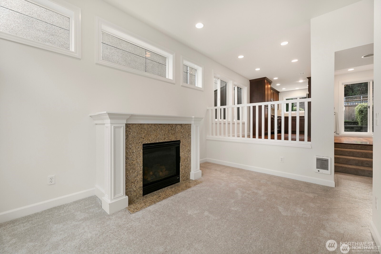 102 West Florentia Street, Unit A Seattle, WA 98119 - Photo 4 of 19 a view of a livingroom with a fireplace