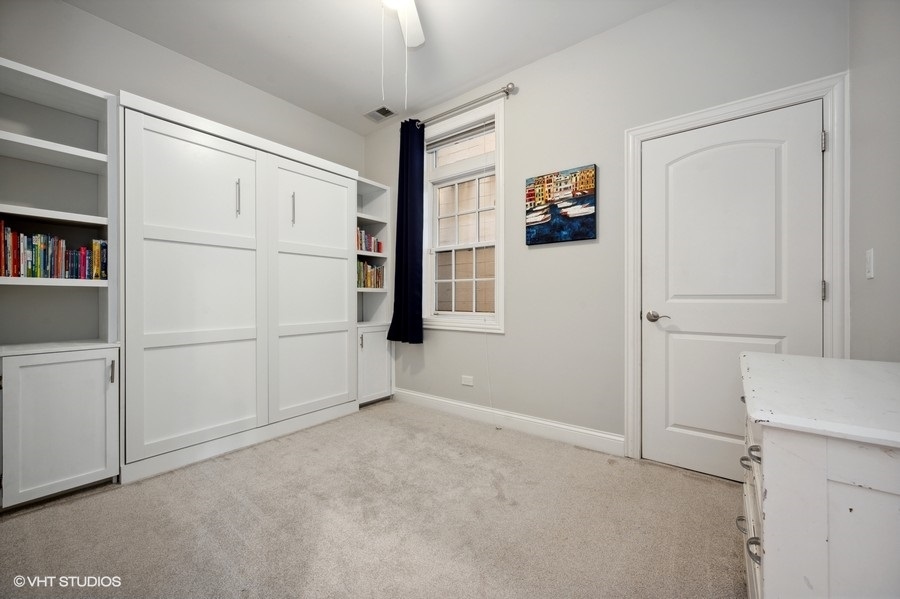 1414 West Irving Park Road, Unit 2E Chicago, IL 60613 - Photo 15 of 19 a view of an empty room with closet