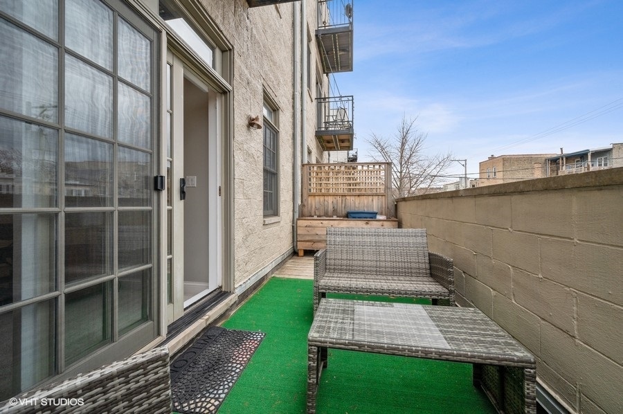 1414 West Irving Park Road, Unit 2E Chicago, IL 60613 - Photo 17 of 19 a view of front door and porch