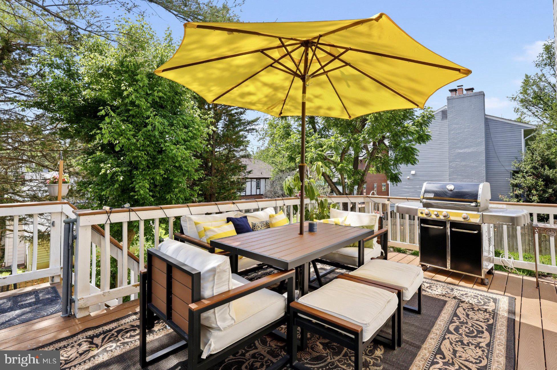 6732 Churchill Road McLean, VA 22101 - Photo 51 of 61 Sunny deck with vibrant yellow umbrella.