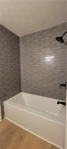 a bathroom with a bathtub