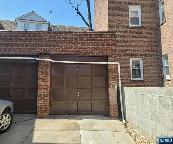 a view of a brick house with a door