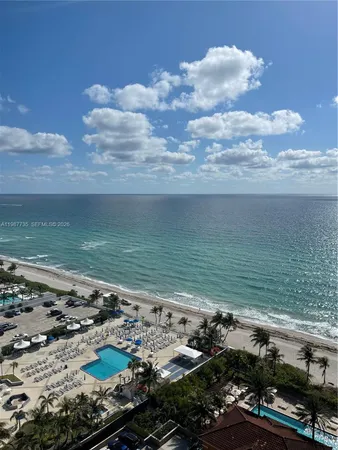 a view of a ocean with beach