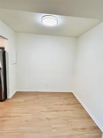 a view of a room with an empty space