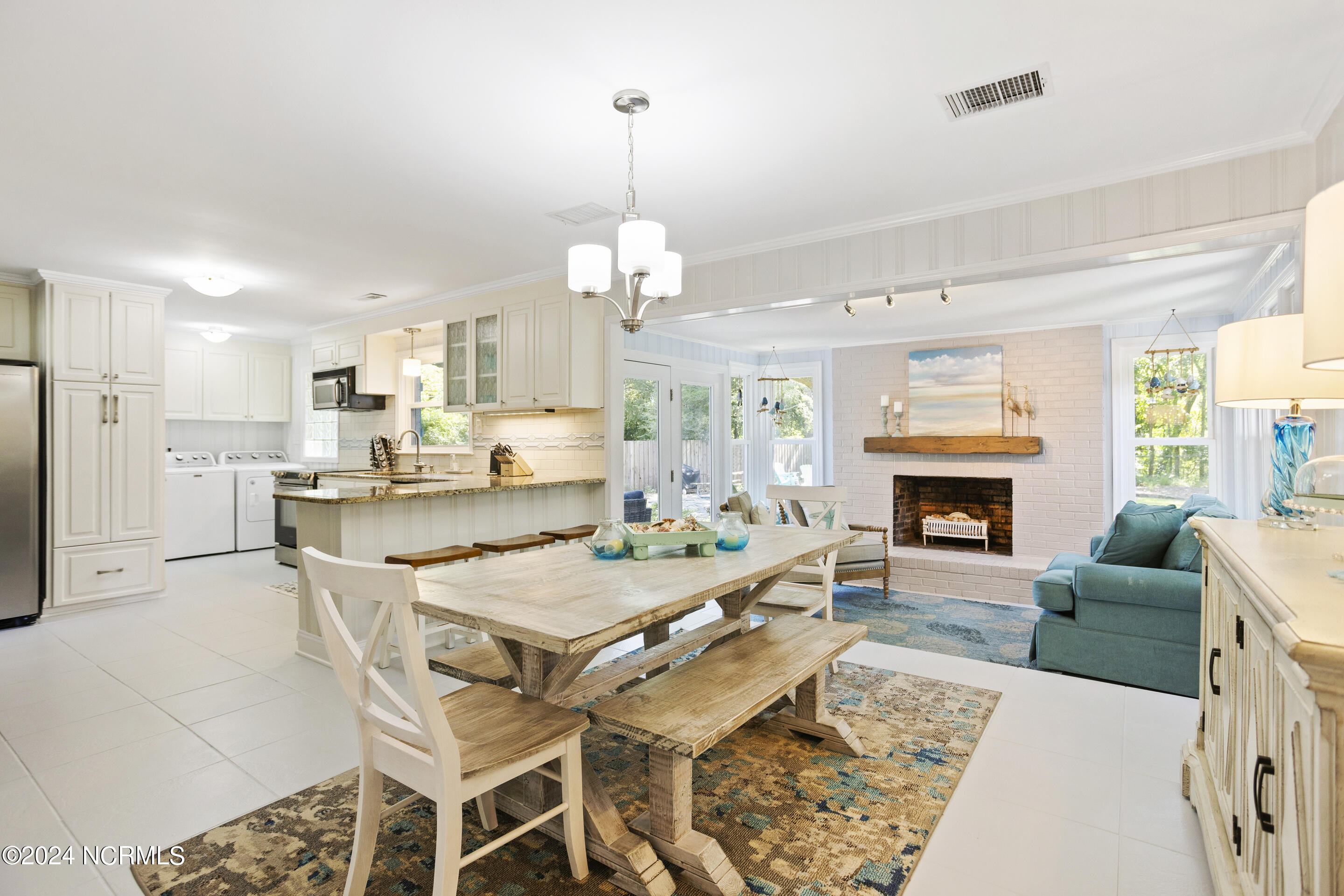 3926 Edgewood Road Wilmington, NC 28403 - Photo 12 of 47 3926 Edgewood dining kitchen sunroom
