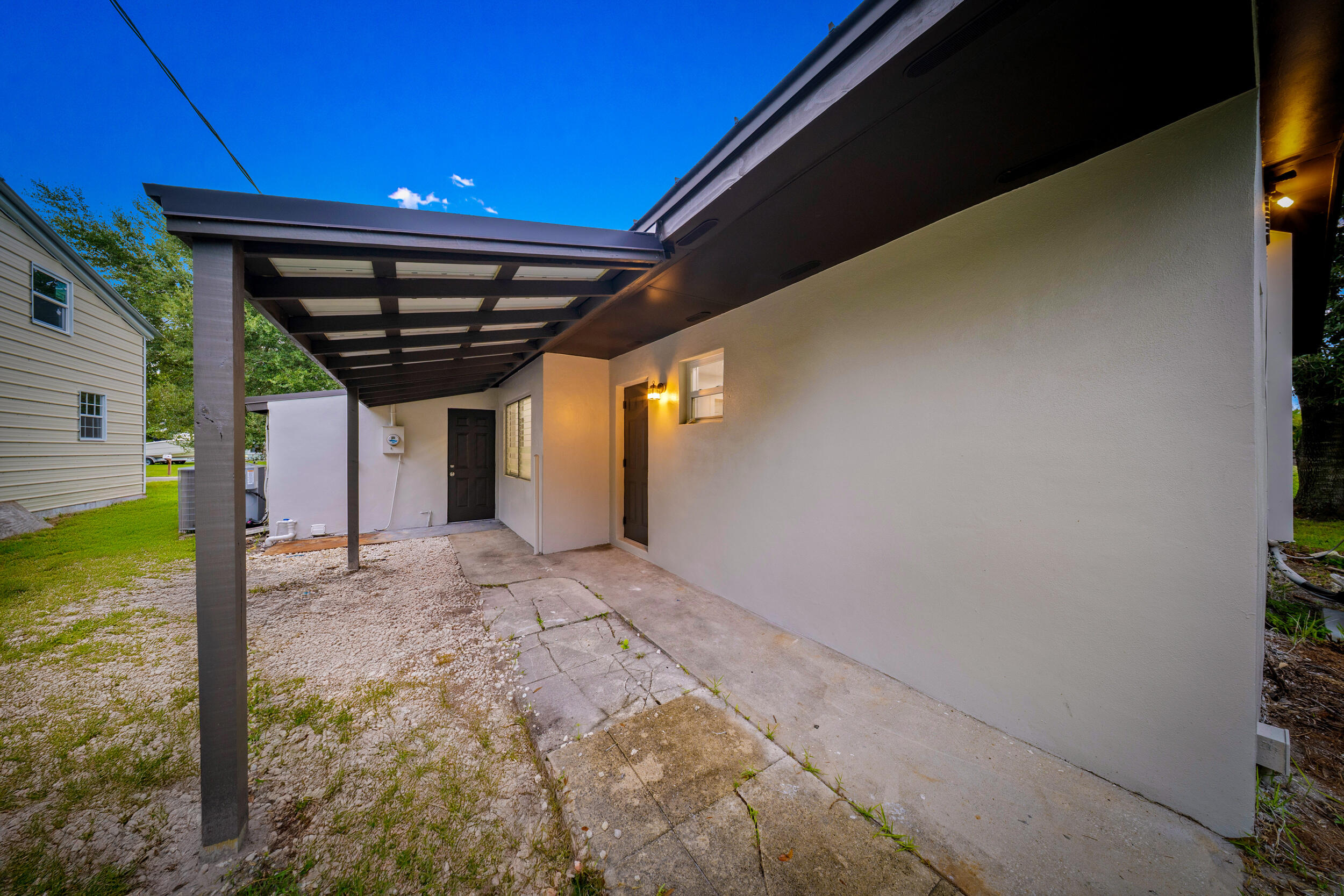2904 Southeast Bamboo Street Stuart, FL 34997 - Photo 33 of 51 a view of a backyard of a house