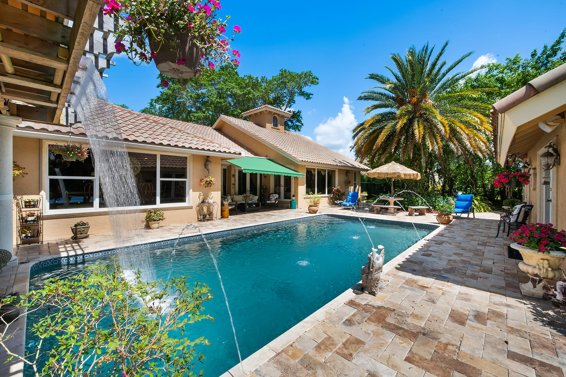 18262 Daybreak Drive Boca Raton, FL 33496 - Photo 36 of 53 Pool with Waterfall