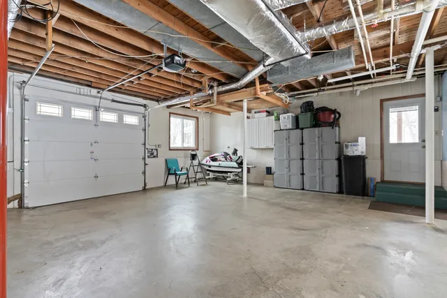 a view of empty room with wooden ceiling