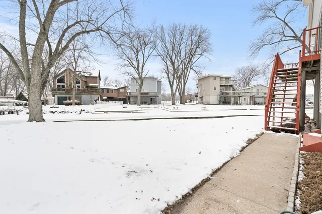a house with swimming pool in front of it