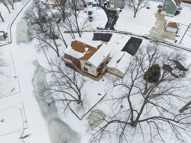 a view of a yard with a tree