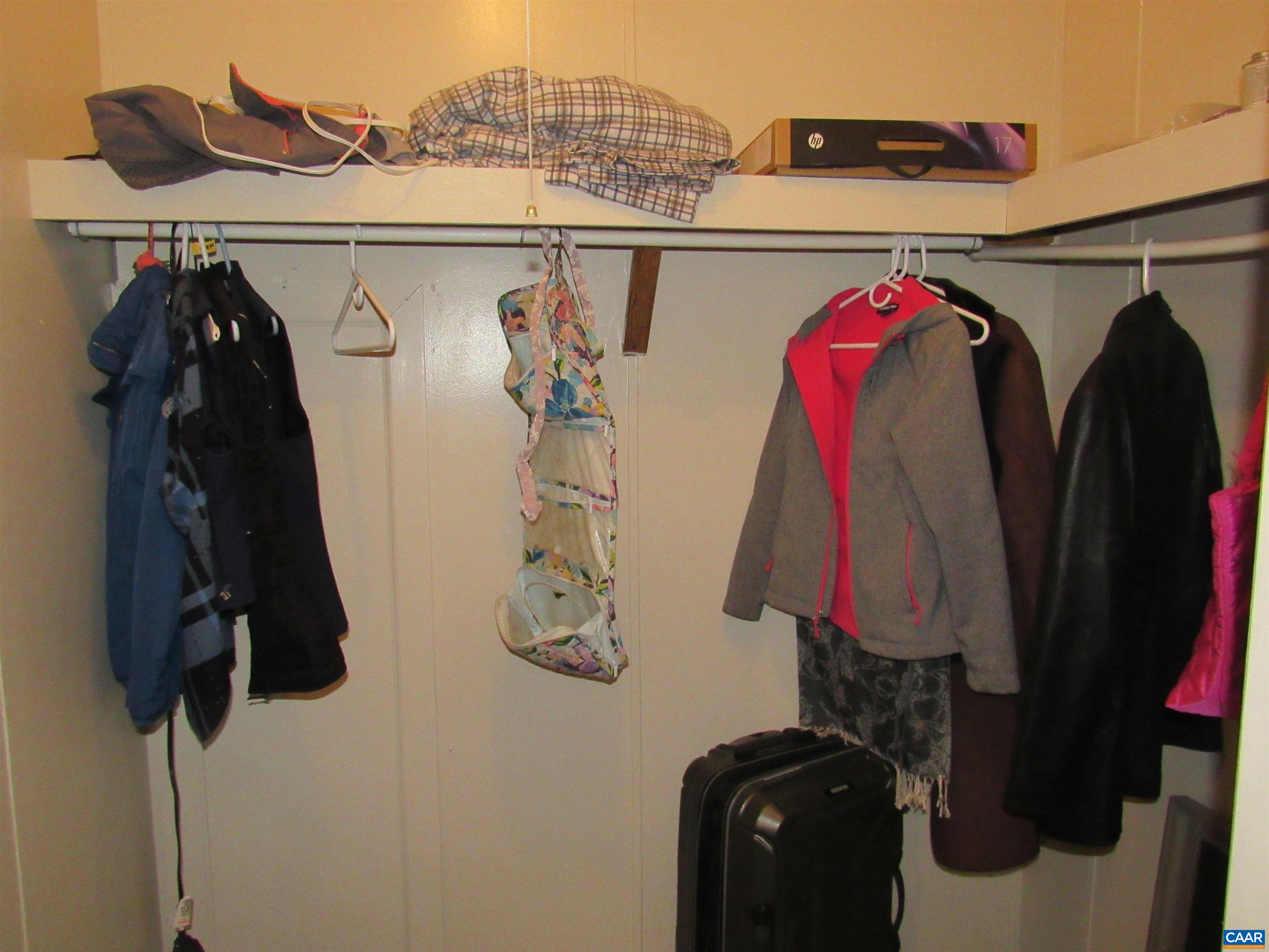 1992 Jerusalem Church Road Buckingham, VA 23921 - Photo 16 of 33 a view of walk in closet with clothes and shoes