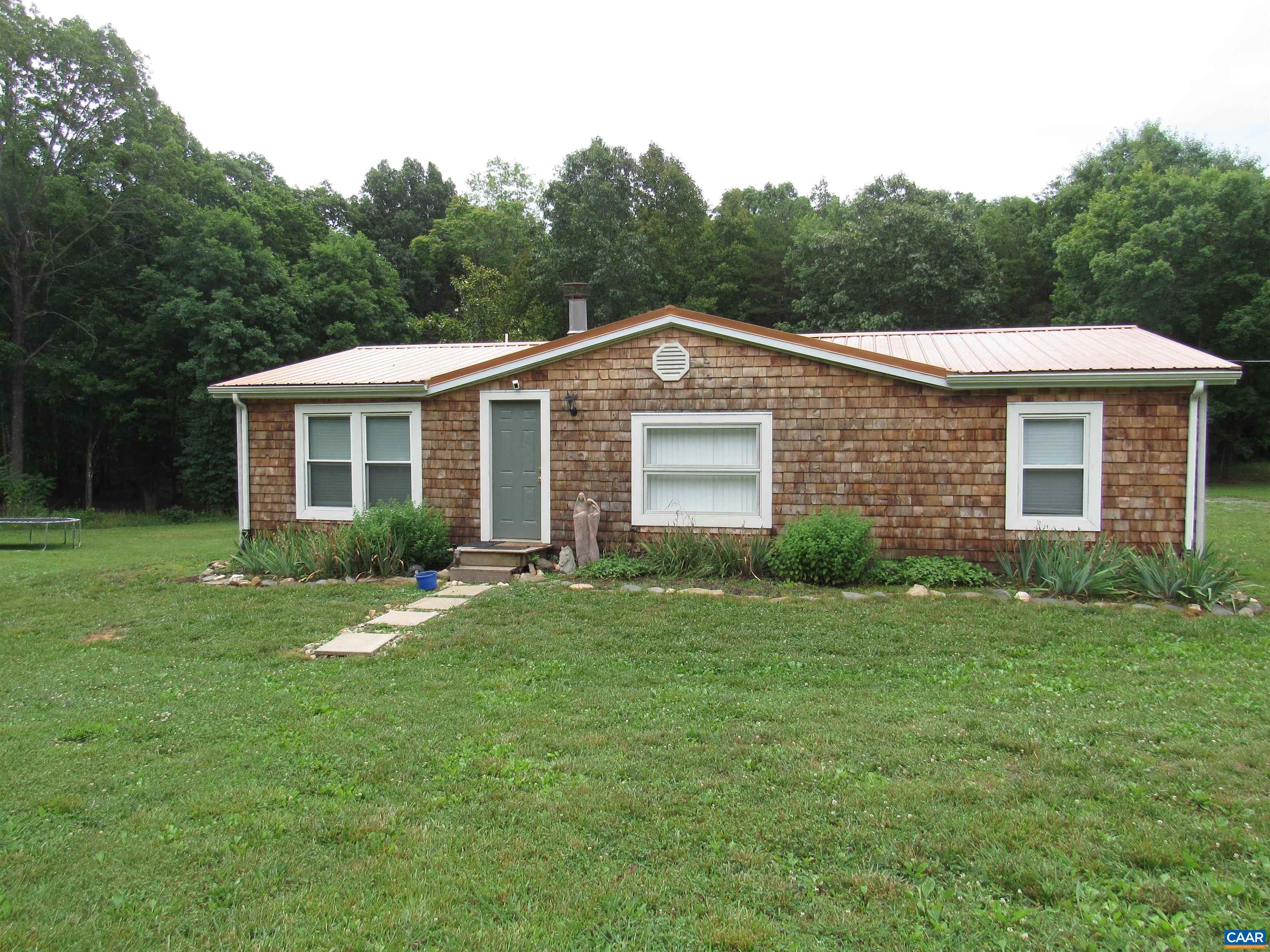 1992 Jerusalem Church Road Buckingham, VA 23921 - Photo 2 of 33 a front view of a house with a yard