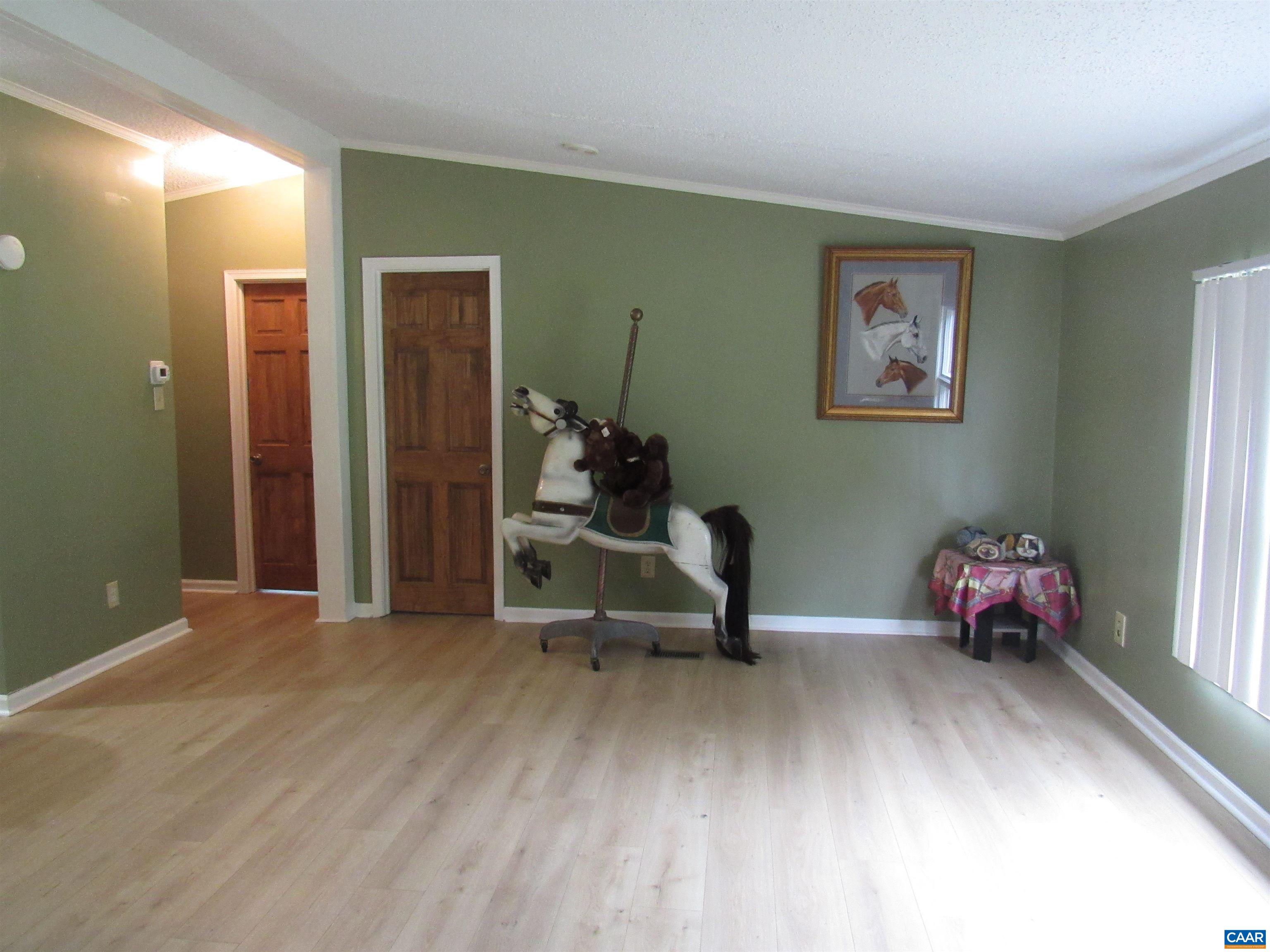 1992 Jerusalem Church Road Buckingham, VA 23921 - Photo 21 of 33 a living room with furniture and a wooden floor