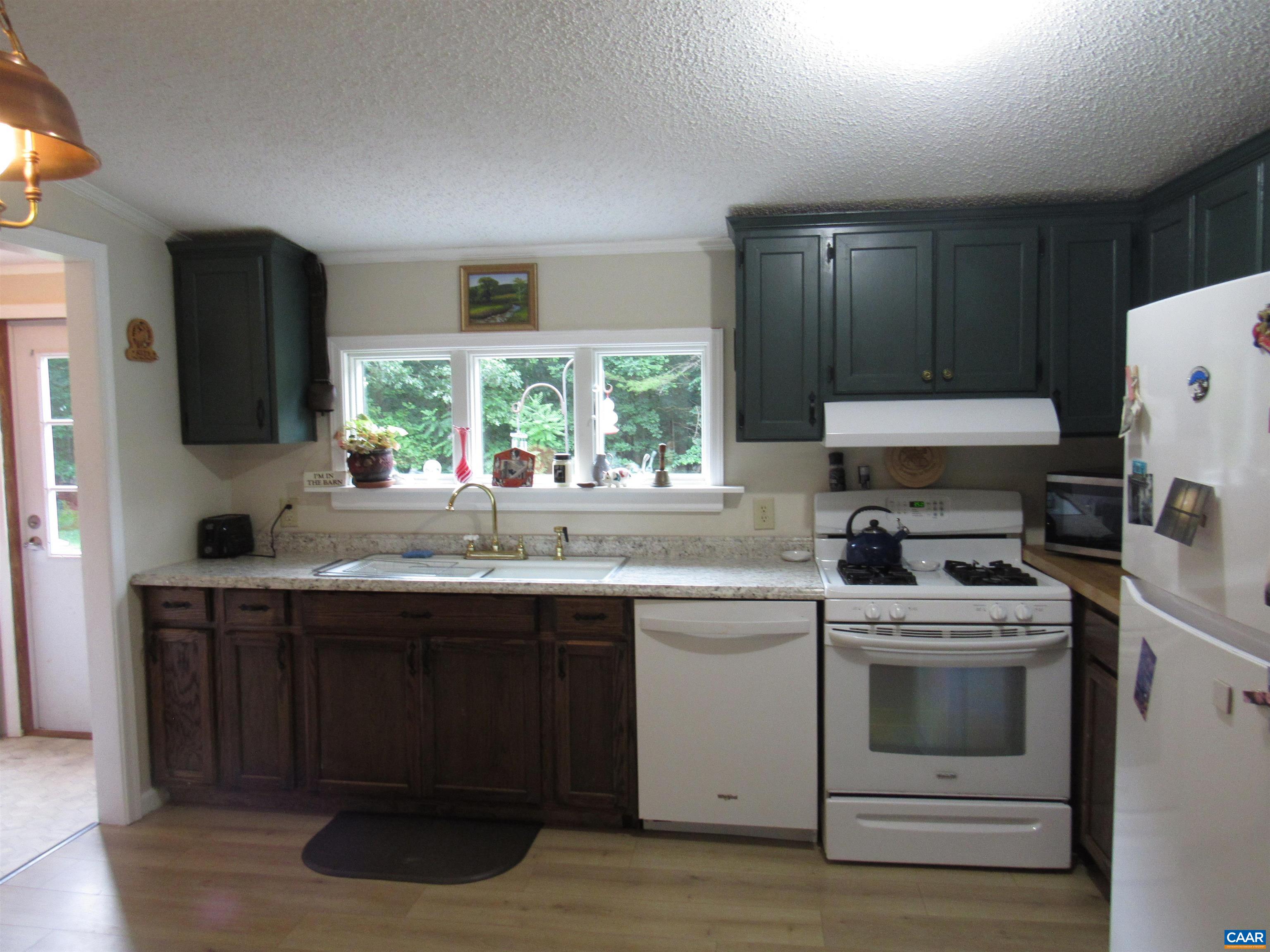 1992 Jerusalem Church Road Buckingham, VA 23921 - Photo 24 of 33 a kitchen with a stove sink and refrigerator