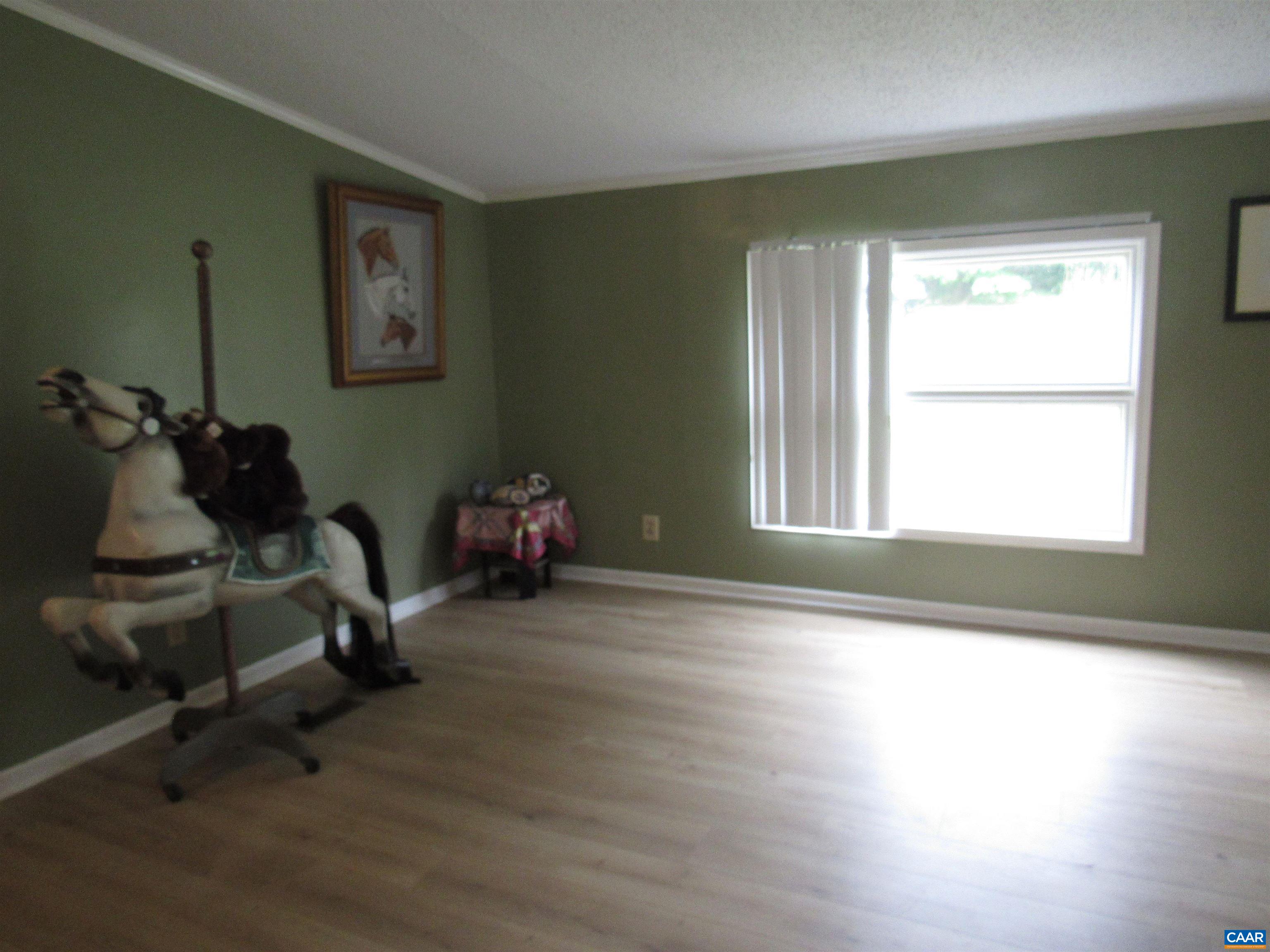 1992 Jerusalem Church Road Buckingham, VA 23921 - Photo 9 of 33 a room with gym equipment and a window